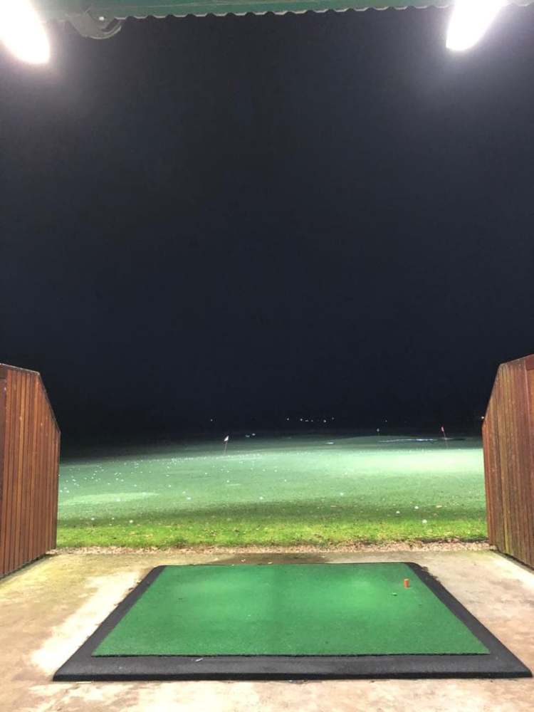 floodlit grass field