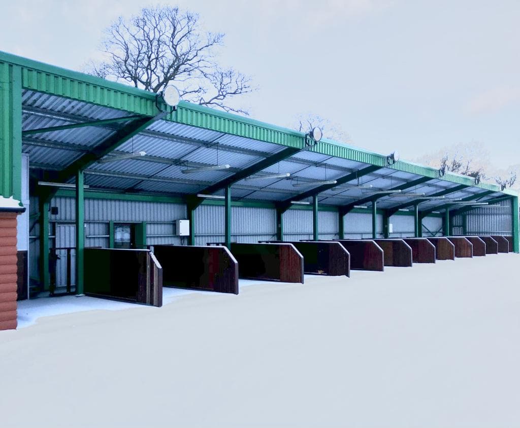 driving range bays in snow