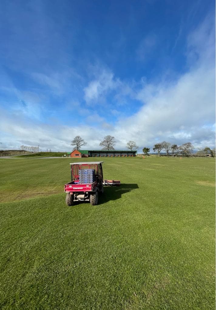 grass field with ball collector